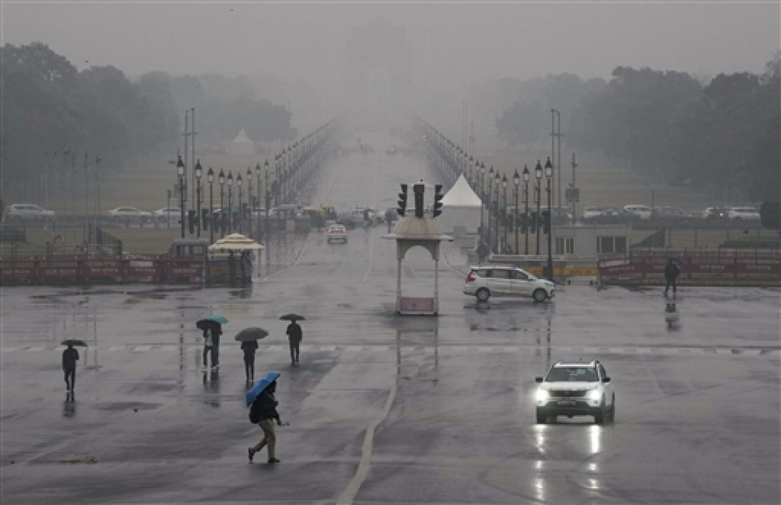 IN PHOTOS: Rain lashes Delhi, more showers expected with 'very poor' air quality