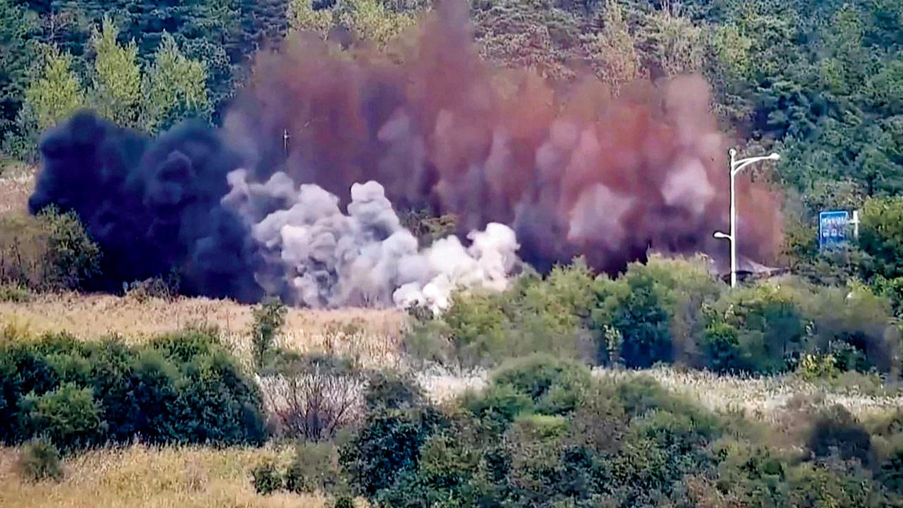 North Korea blows up connecting roads in display of anger