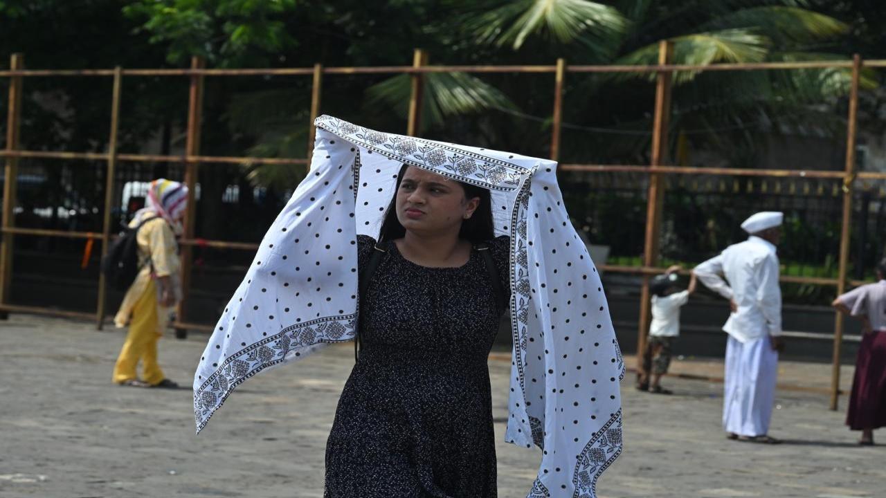 IN PHOTOS: Mumbaikars reel under October heat 