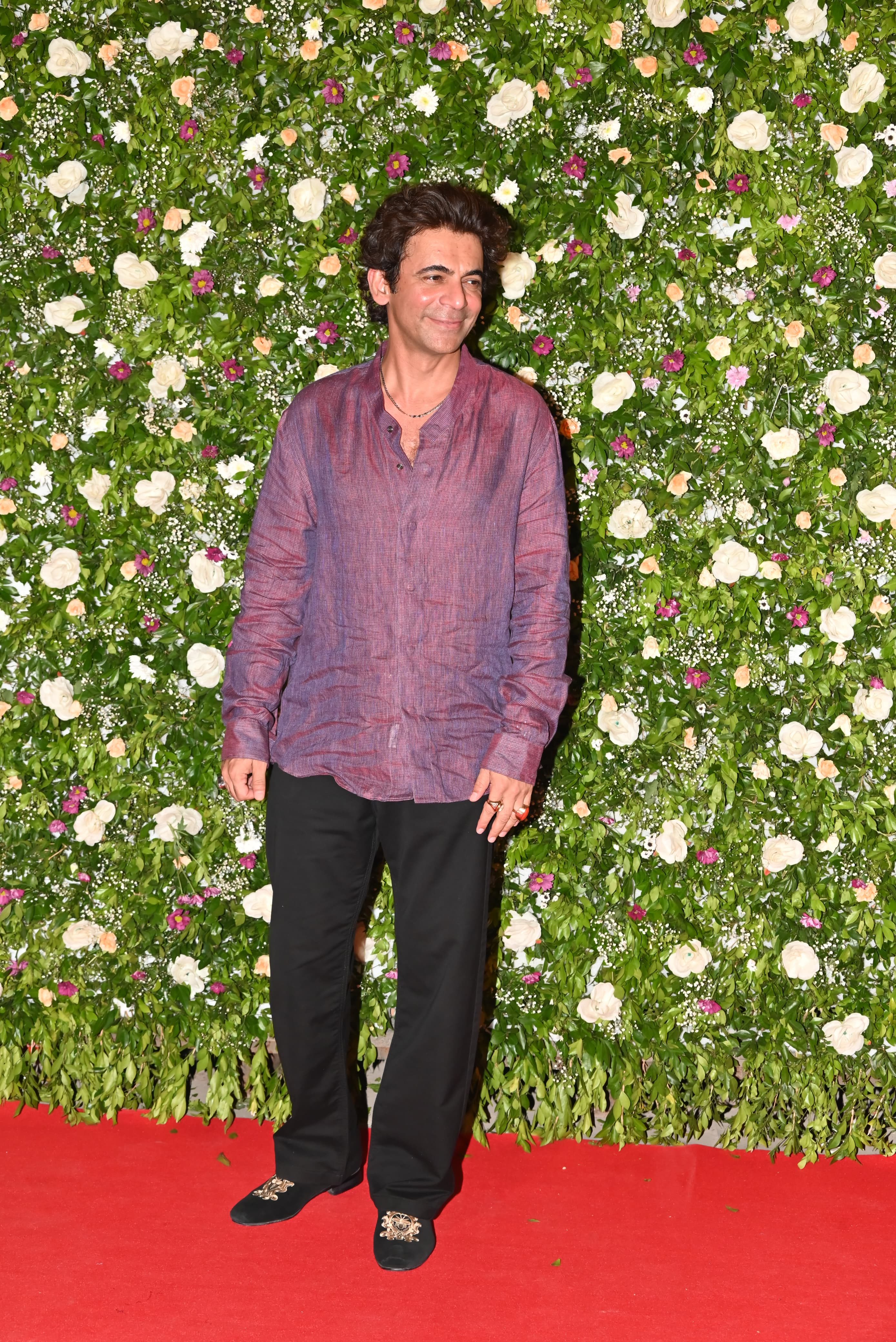 Sunil Grover went the simple route and donned a purple kurta for the occasion