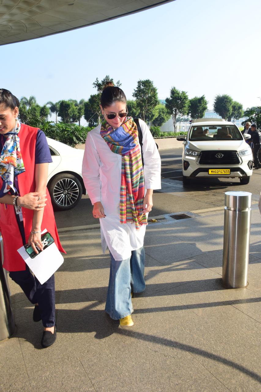 Kareena Kapoor was snapped at Mumbai airport. The actress stunned in a white kurta, jeans and multi-coloured dupatta