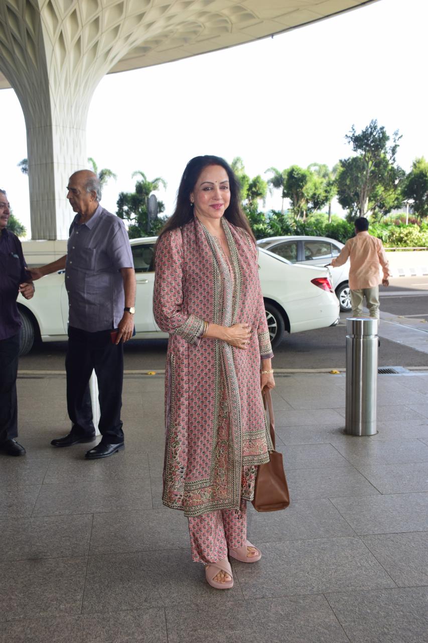 Veteran actress Hema Malini looked stunning in a beautiful suit as she was spotted at the airport