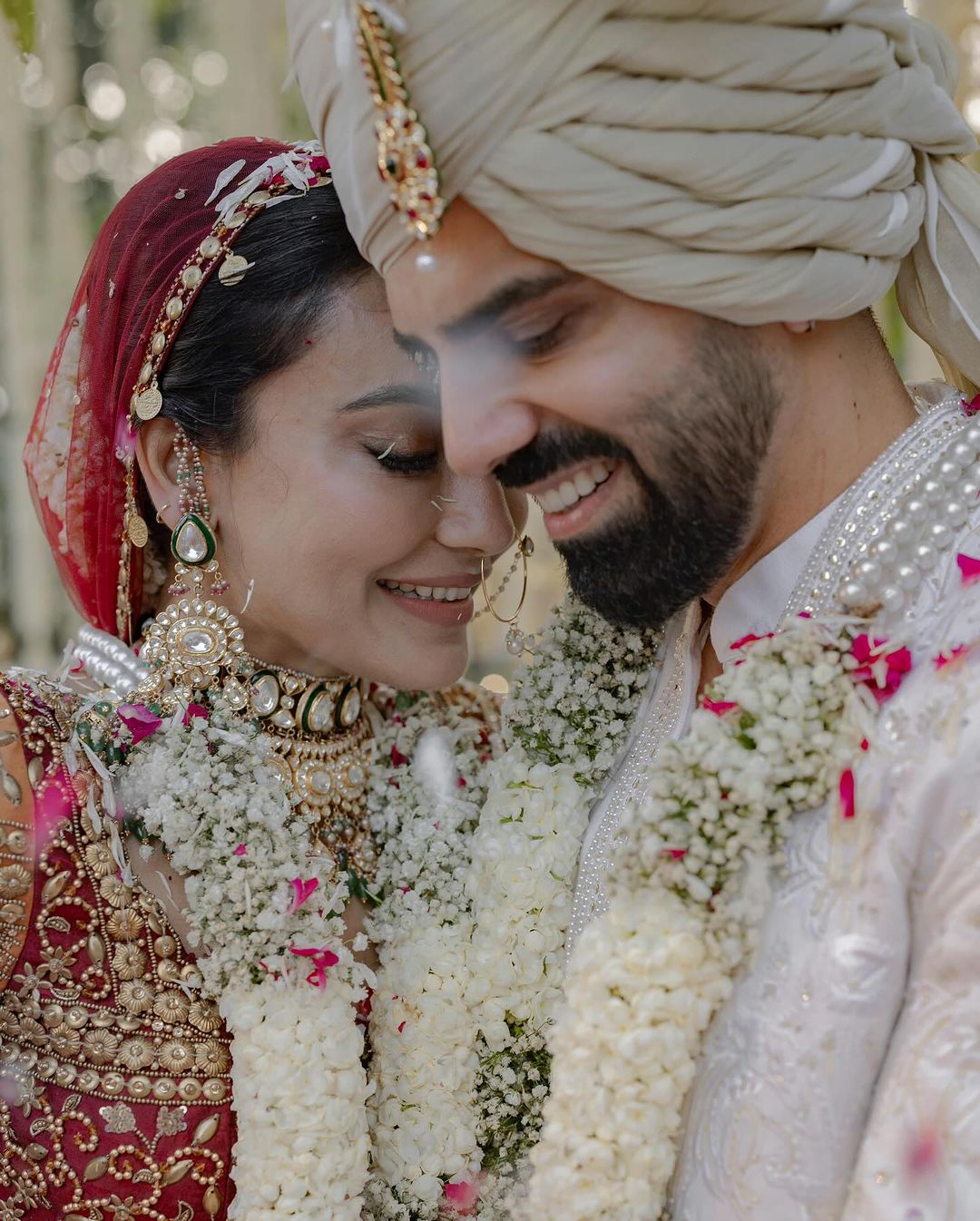 Unlike the mundane beige and pastel brides, Surbhi opted for a bespoke red lehenga and also wore the traditional red choora on her special day