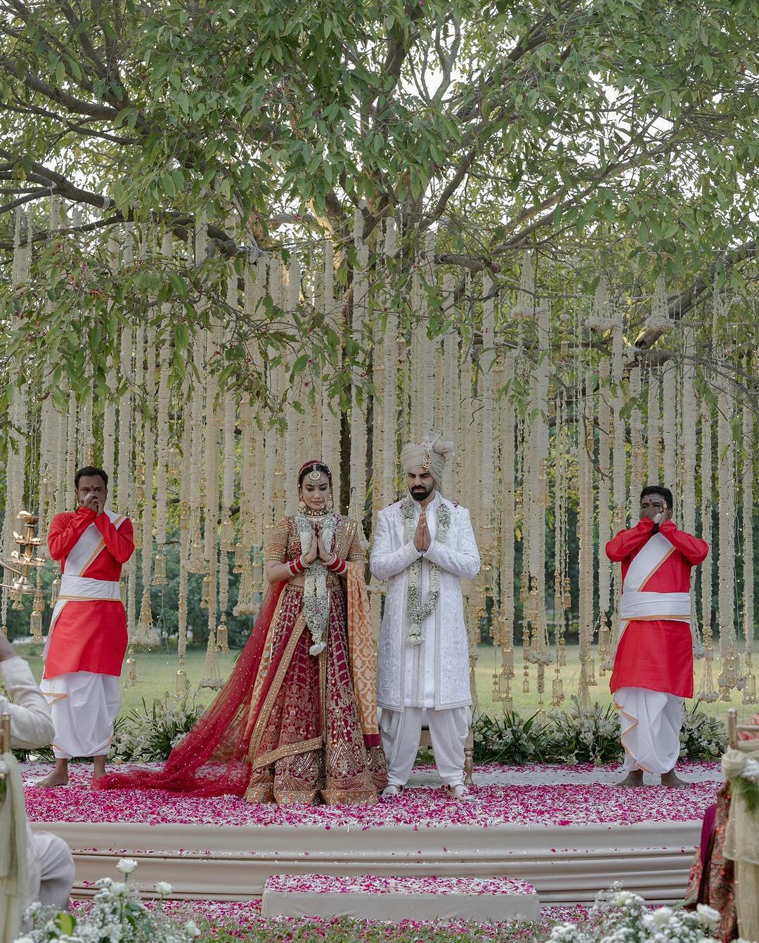 The duo wore customized outfits by ace designer Neeta Lulla. In the picture, we could see that the duo opted for a white varmala, adding to the scenic vibe.
 