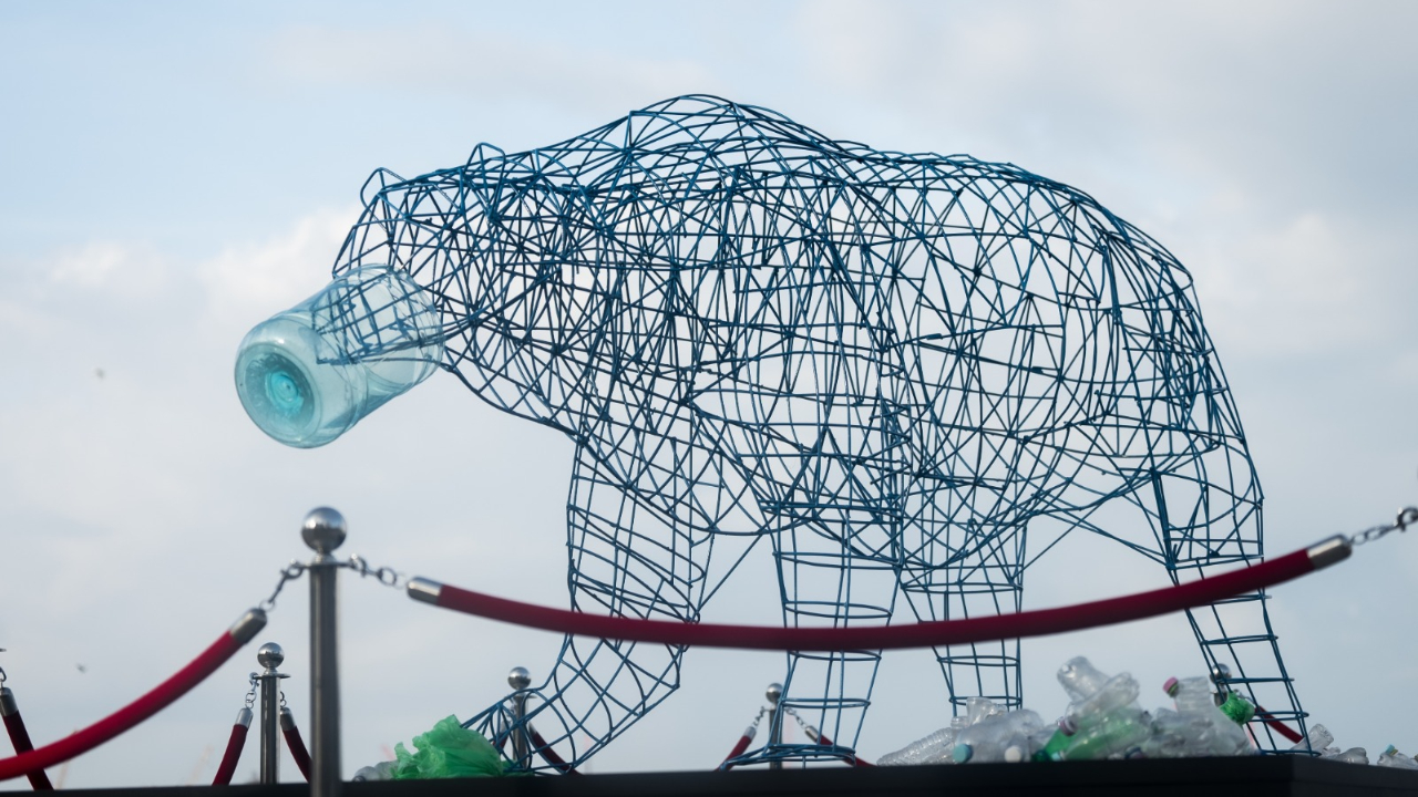 One of the installations depicts an Asiatic Black Bear with its head caught in a discarded plastic container, representing how animals unwittingly become victims of human waste.