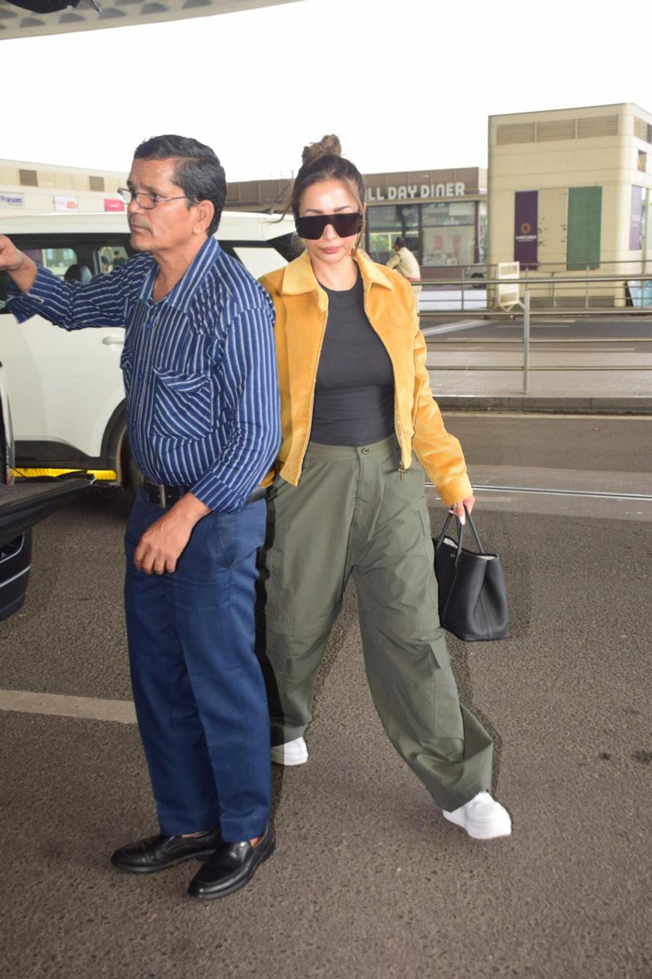 Malaika Arora, who recently lost her stepfather Anil Mehta was spotted at the airport. 