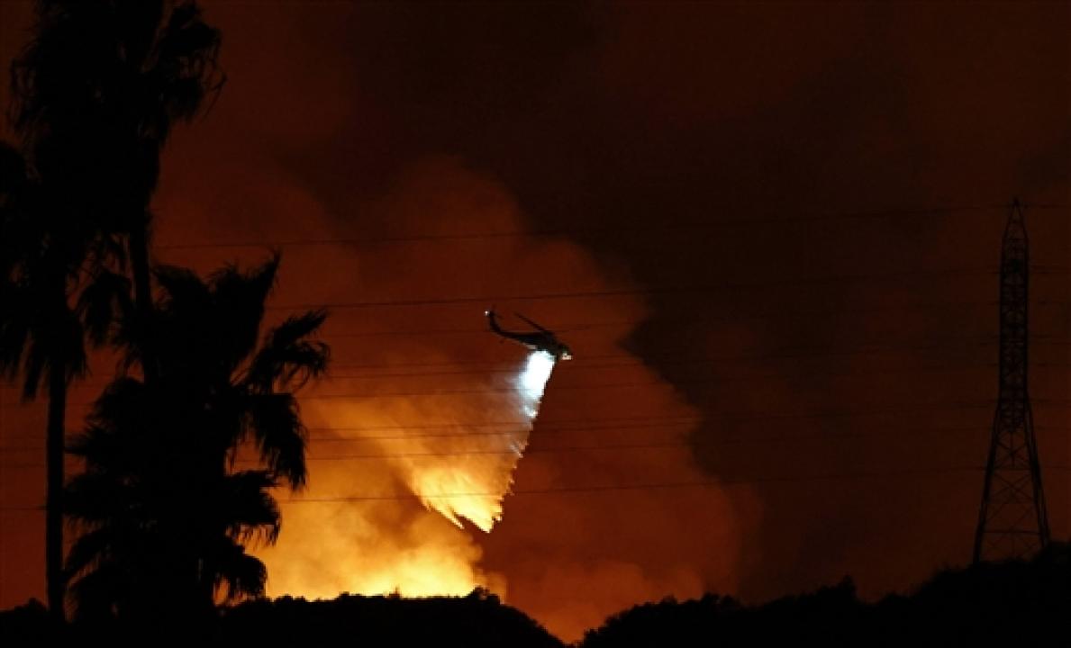 IN PHOTOS: Death toll rises to 11 in California wildfires as evacuations expand